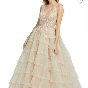 Worn once Mac Duggal gown in ivory . Gown is very light weight .